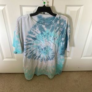 This graphic tee is one size fits all, and it has an oversized fit.